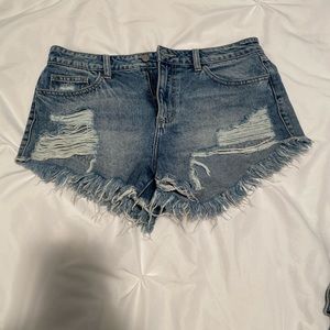 Blue ripped denim jean shorts
